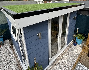 Timber and UPVC-clad garden room