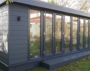 White UPVC-clad garden room