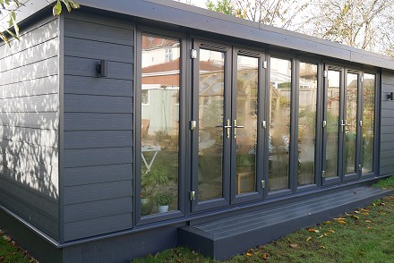 EYG builds its biggest ever garden room for family with four generations all under one roof!