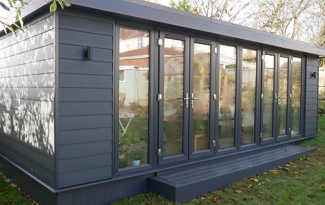 EYG builds its biggest ever garden room for family with four generations all under one roof!